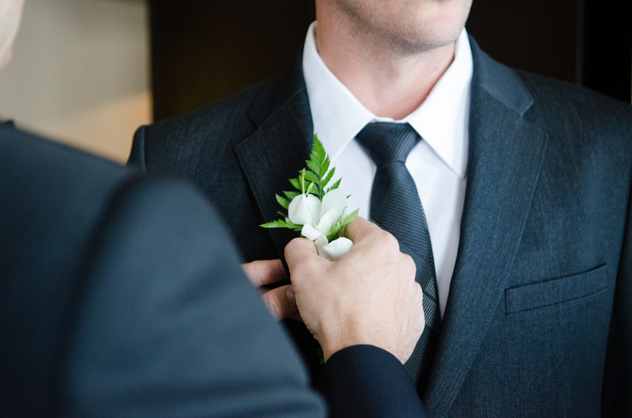 a groom getting ready for his wedding